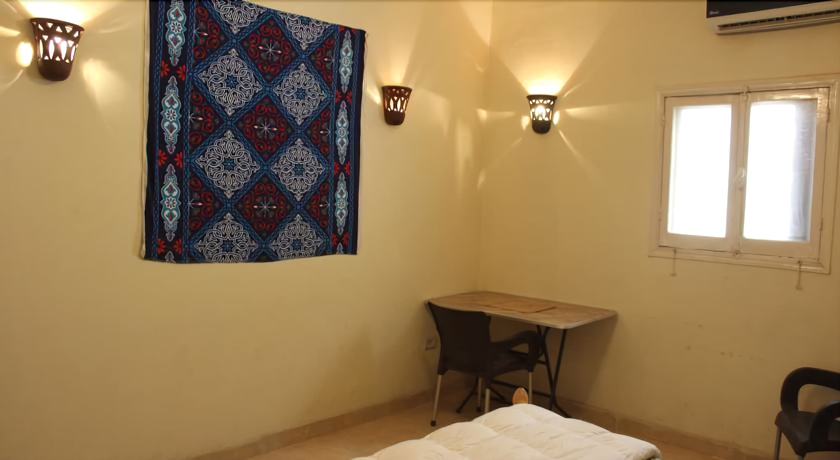 Imagen de la habitación del Hotel Pyramids Loft Homestay. Foto 10