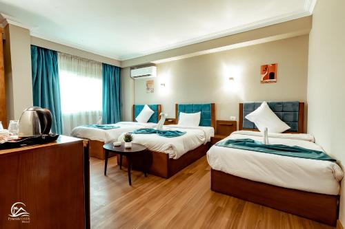 Imagen de la habitación del Hotel Pyramids Oasis. Foto 16