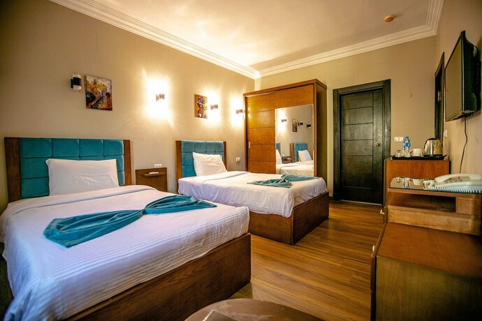 Imagen de la habitación del Hotel Pyramids Oasis, Giza. Foto 15