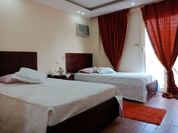 Imagen de la habitación del Hotel Pyramids Plateau Inn. Foto 6