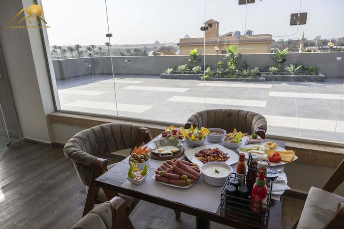 Imagen del bar/restaurante del Hotel Pyramids Sunrise Inn. Foto 10