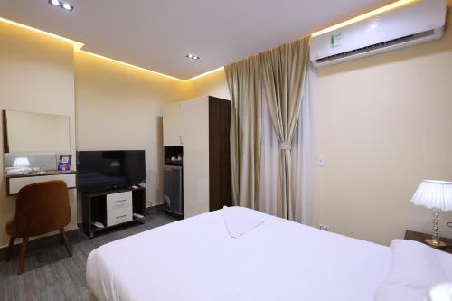 Imagen de la habitación del Hotel Pyramids Sunshine. Foto 16