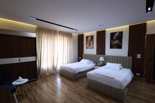 Imagen de la habitación del Hotel Pyramids Sunshine. Foto 17