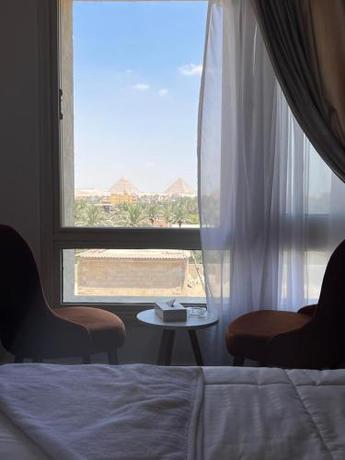 Imagen de la habitación del Hotel Pyramids Sunshine View. Foto 13