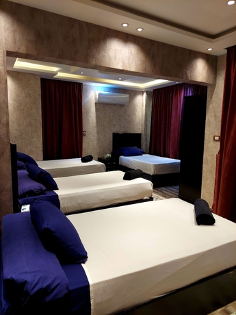 Imagen de la habitación del Hotel Pyramids planet hotel. Foto 7