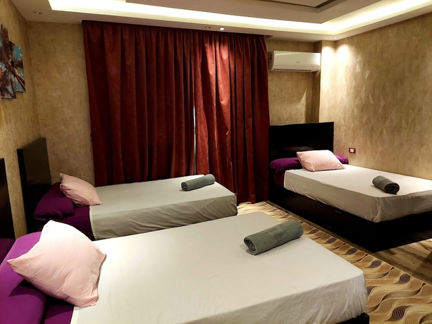 Imagen de la habitación del Hotel Pyramids planet hotel. Foto 8