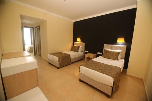 Imagen de la habitación del Hotel Q Ella Beach Side. Foto 19