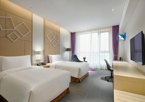 Imagen general del Hotel Q Haikou Meilan. Foto 2