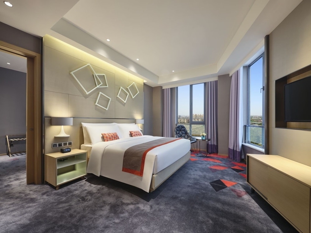 Imagen de la habitación del Hotel Q Hotel Shanghai Pudong. Foto 13