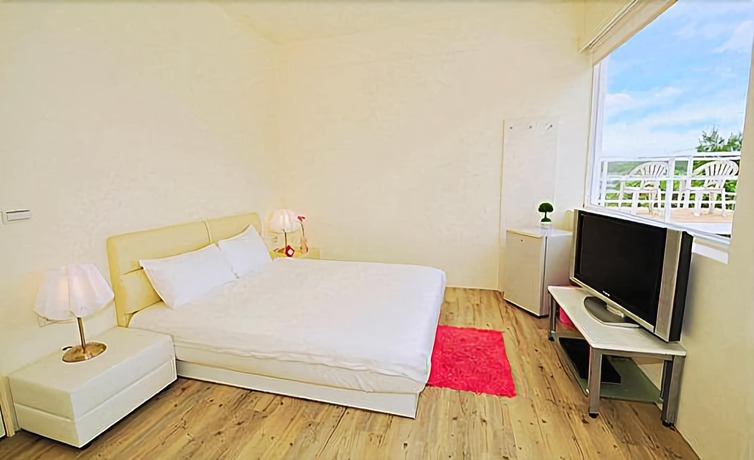 Imagen de la habitación del Hotel Q House. Foto 3