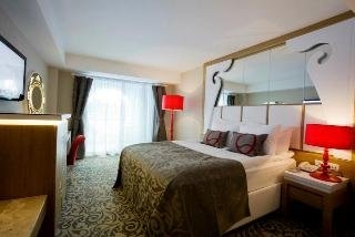 Imagen de la habitación del Hotel Q Premium Resort. Foto 6