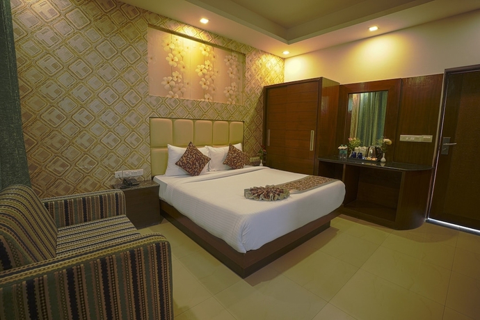 Imagen de la habitación del Hotel Q Saina\'s S K Regency. Foto 2