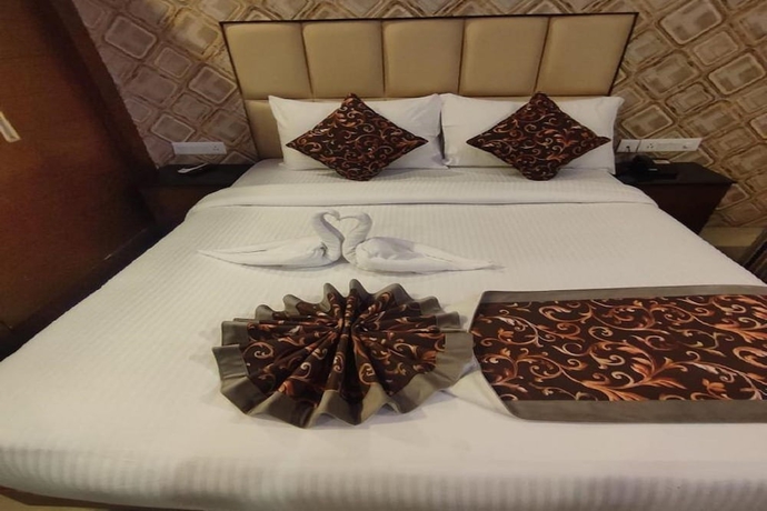 Imagen de la habitación del Hotel Q Saina\'s S K Regency. Foto 12