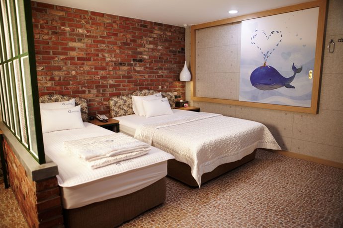 Imagen de la habitación del Hotel Q5 Hotel. Foto 9