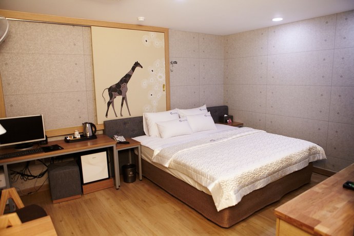 Imagen de la habitación del Hotel Q5 Hotel. Foto 15