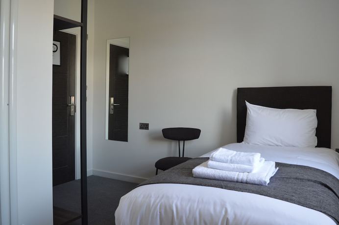 Imagen de la habitación del Hotel Q8 Boutique. Foto 17
