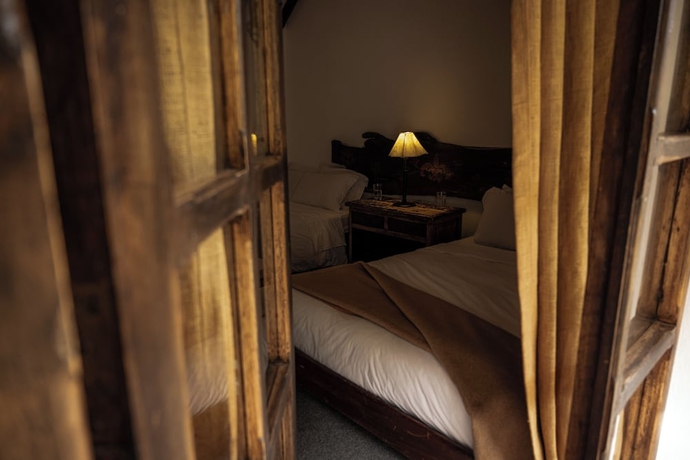 Imagen de la habitación del Hotel QASA Valle Sagrado by Nomad. Foto 12