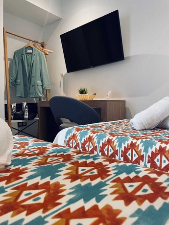 Imagen de la habitación del Hotel QB Almagro Centro. Foto 14