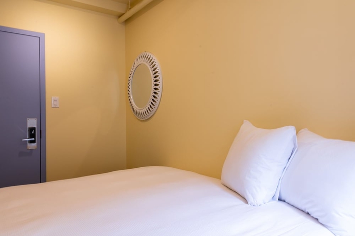 Imagen de la habitación del Hotel QBEDS Hostel. Foto 13