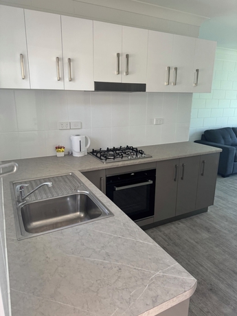 Imagen de la habitación del Hotel QCWA Kissing Point Units. Foto 14