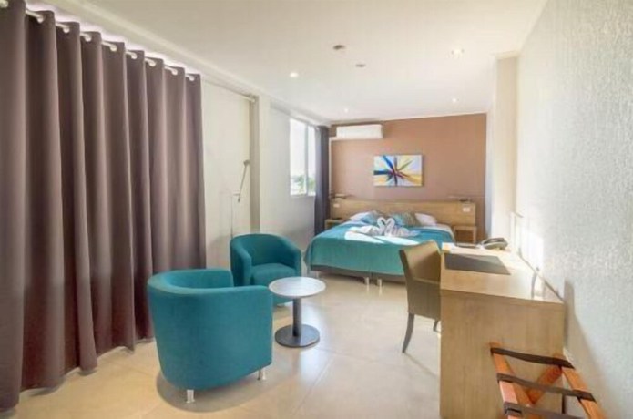 Imagen de la habitación del Hotel Q-Inn Boutique. Foto 16