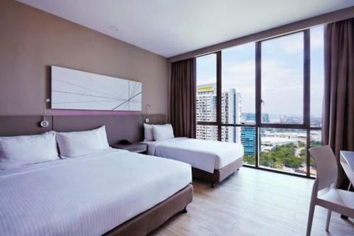 Imagen general del Hotel QQ Empire Damansara hotel room. Foto 4