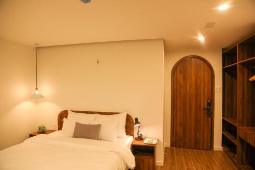 Imagen de la habitación del Hotel QR Dalat. Foto 11