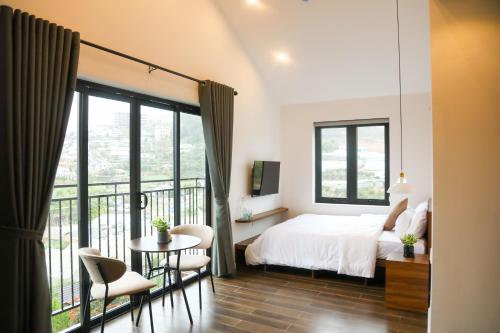 Imagen de la habitación del Hotel QR Dalat. Foto 12