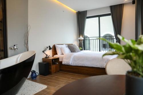 Imagen de la habitación del Hotel QR Dalat. Foto 13