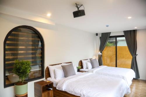 Imagen de la habitación del Hotel QR Dalat. Foto 15