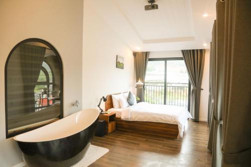 Imagen de la habitación del Hotel QR Dalat. Foto 16