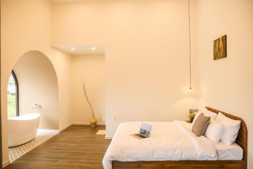 Imagen de la habitación del Hotel QR Dalat. Foto 17