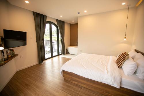 Imagen de la habitación del Hotel QR Dalat. Foto 18