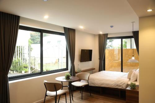 Imagen de la habitación del Hotel QR Dalat. Foto 19