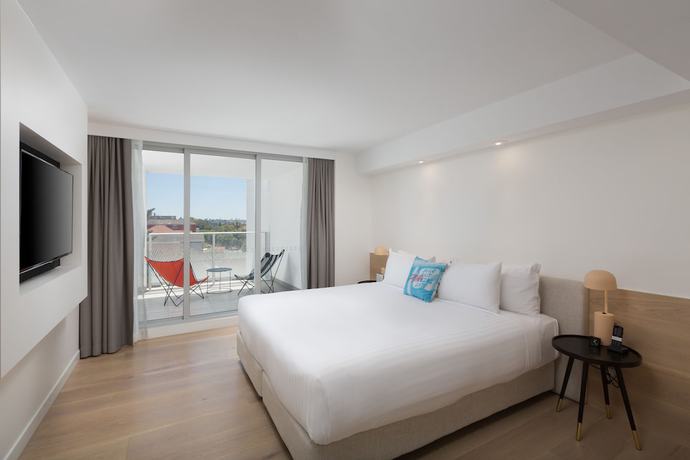 Imagen de la habitación del Hotel QT Bondi. Foto 8