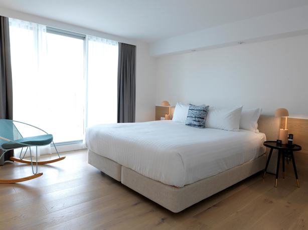 Imagen de la habitación del Hotel QT Bondi. Foto 17