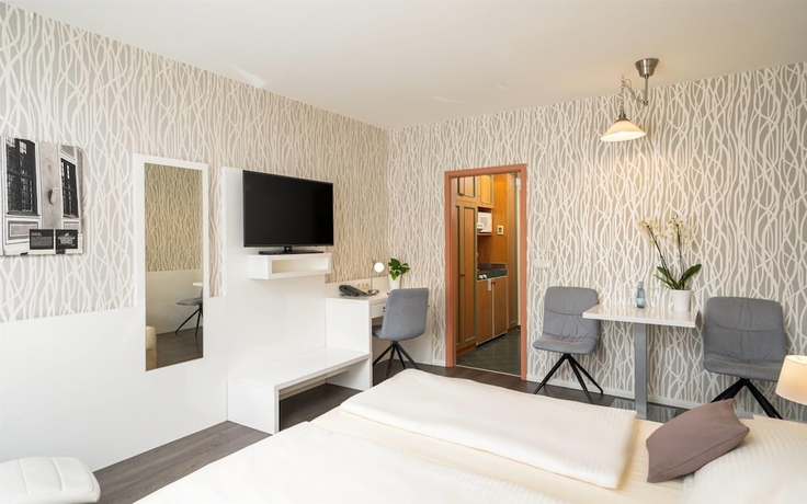 Imagen de la habitación del Hotel QU Augsburg. Foto 3