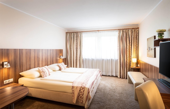 Imagen de la habitación del Hotel QU Augsburg. Foto 6