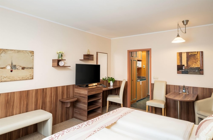 Imagen de la habitación del Hotel QU Augsburg. Foto 7
