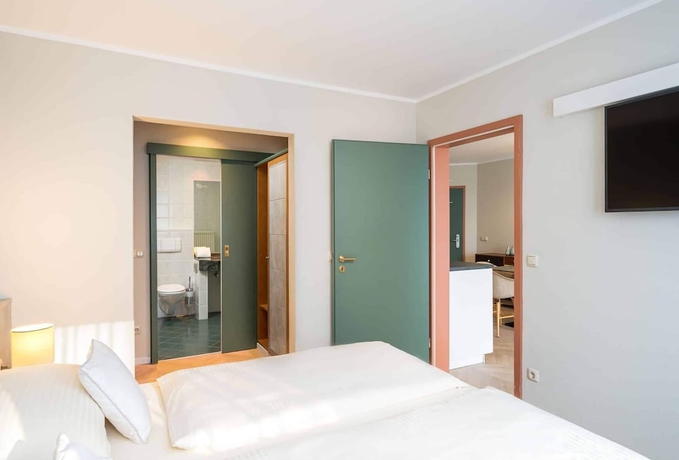 Imagen de la habitación del Hotel QU Augsburg. Foto 9