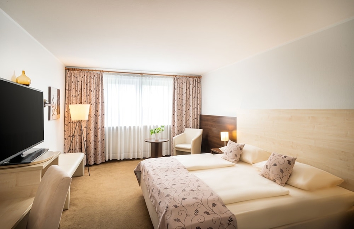 Imagen de la habitación del Hotel QU Augsburg. Foto 11