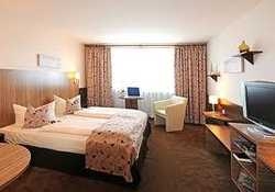 Imagen de la habitación del Hotel QU Augsburg. Foto 2