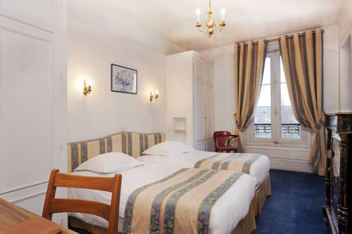 Imagen de la habitación del Hotel QUAI VOLTAIRE. Foto 3