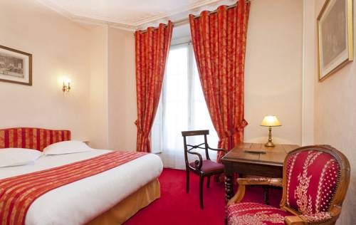 Imagen de la habitación del Hotel QUAI VOLTAIRE. Foto 4