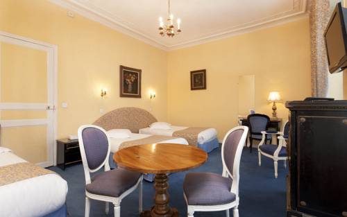 Imagen de la habitación del Hotel QUAI VOLTAIRE. Foto 5