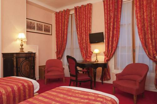 Imagen de la habitación del Hotel QUAI VOLTAIRE. Foto 6