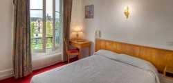 Imagen de la habitación del Hotel QUAI VOLTAIRE. Foto 8