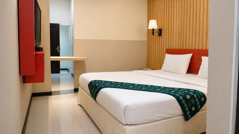 Imagen de la habitación del Hotel QUEEN CITY HOTEL. Foto 10