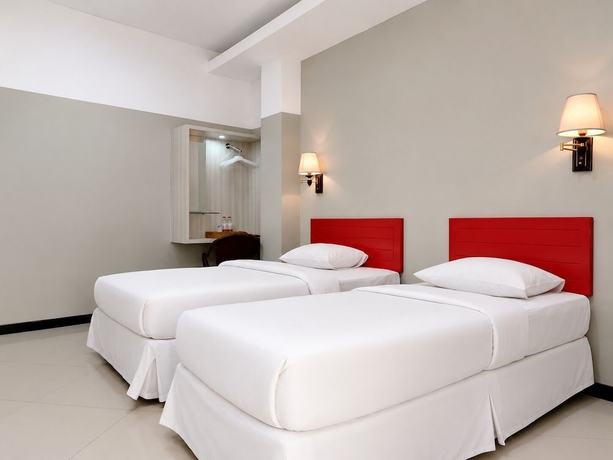 Imagen de la habitación del Hotel QUEEN CITY HOTEL. Foto 11