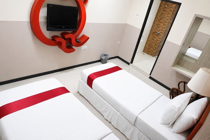 Imagen de la habitación del Hotel QUEEN CITY HOTEL. Foto 14